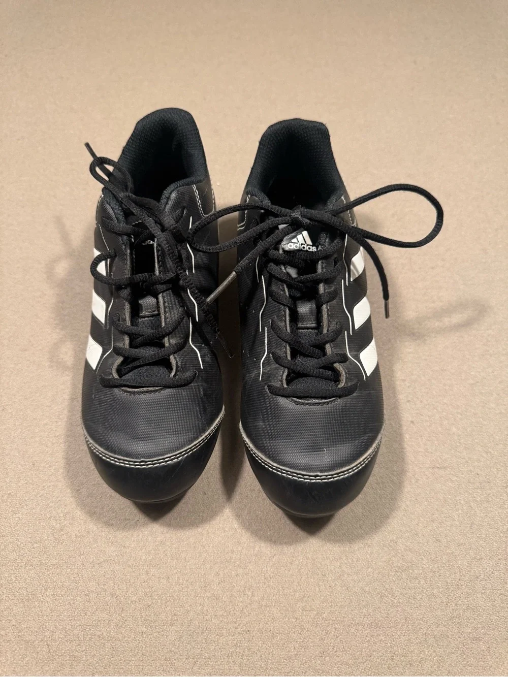 adidas boys  Black Athletic Cleats with White Stripes size 2